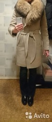 Продам новое зимнее пальто с мехом енота